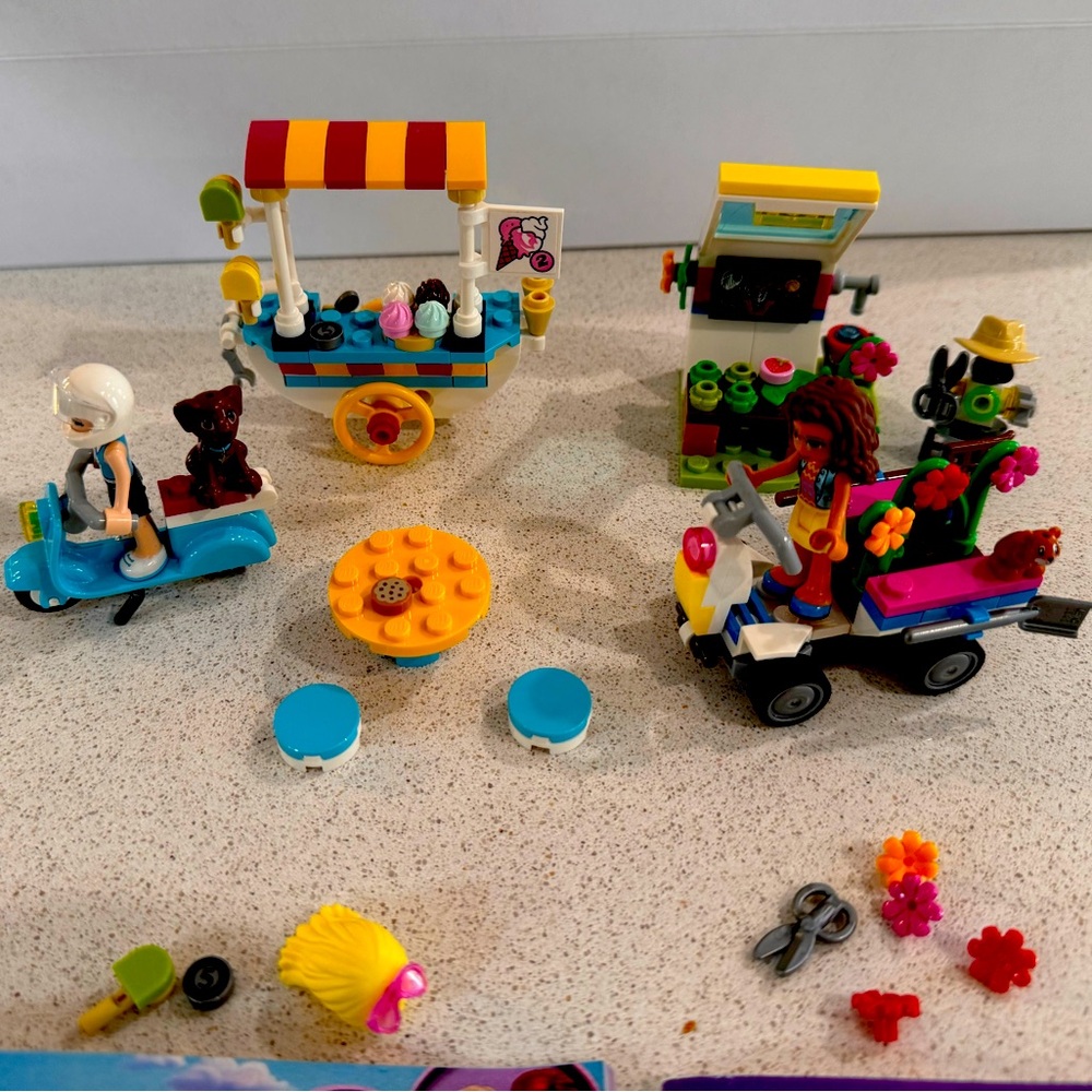 Two used Lego Friends sets. 41389 Ice Cream Cart & 41425 Olivia’s Flower Garden
